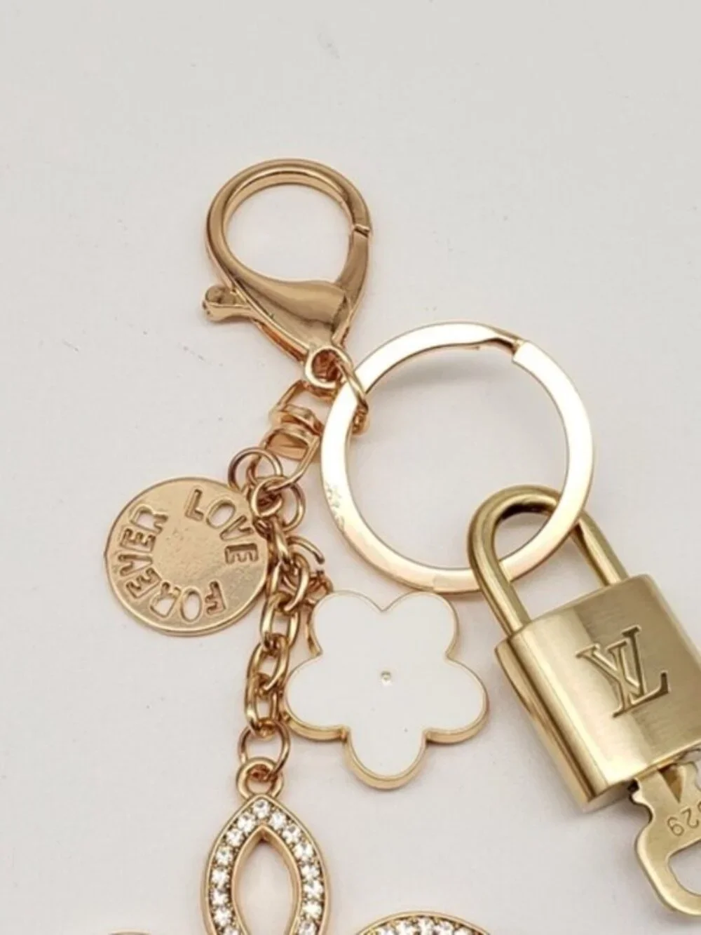 Authentic Louis Vuitton Gold Lock & Key 🔑 Bag Charm w/ Unbranded Clover Charm